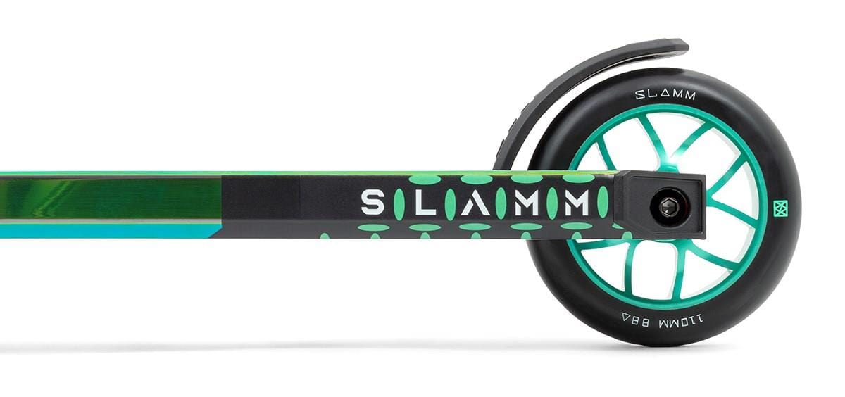 The stylish Slamm Assault Complete Stunt Scooter in Neochrome showcases a vibrant design with an alloy deck and 110mm aluminum wheels, offering both smooth rides and exceptional durability.