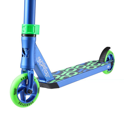 The Sacrifice Flyte 100 V2 Complete Stunt Scooter boasts a blue deck with green circular patterns, matching green and black wheels, a blue T-bar adorned with green grips, and the Sacrifice brand name bold on the frame—ideal for stunning stunts.