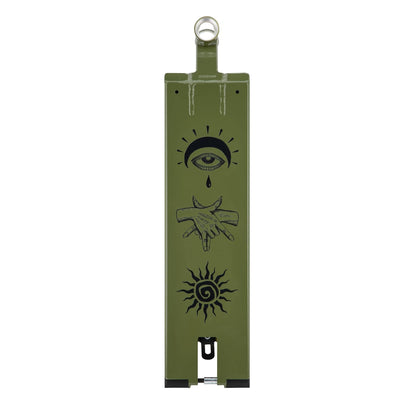 The object is an olive green rectangular product similar to the Drone Nexus 'Ansgar Kroger' Moss Green Signature Stunt Scooter Deck. It has a circular hook on top, adorned with black illustrations: a crying eye, two hands shaking, and a stylized sun.