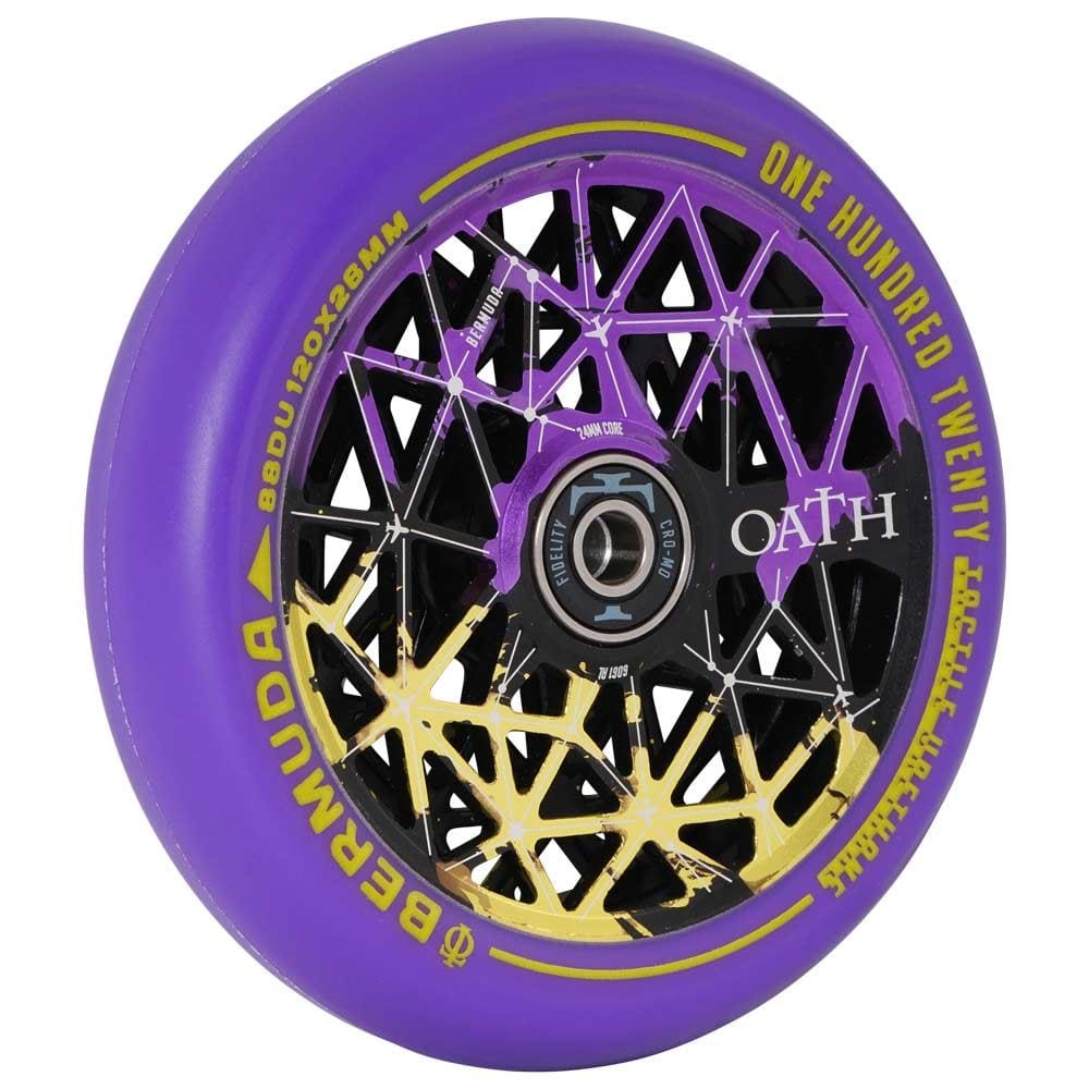 An up-close view of the Oath Bermuda 120mm Stunt Scooter Wheel displays its high-grade Fidelity bearings and distinctive black and yellow geometric spoke design against a purple backdrop. The rim features inscriptions of "Bermuda" and "Oath," highlighting its corrosion resistance, with the wheel size clearly marked as 120mm.