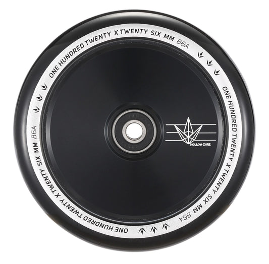 A detailed view of a black scooter wheel with a silver core highlights the Blunt Envy 120mm Hollow Core Stunt Scooter Wheel. The rim is inscribed with "ONE HUNDRED TWENTY X TWENTY SIX MM 86A" in white text, while the core displays a small logo featuring angular lines.