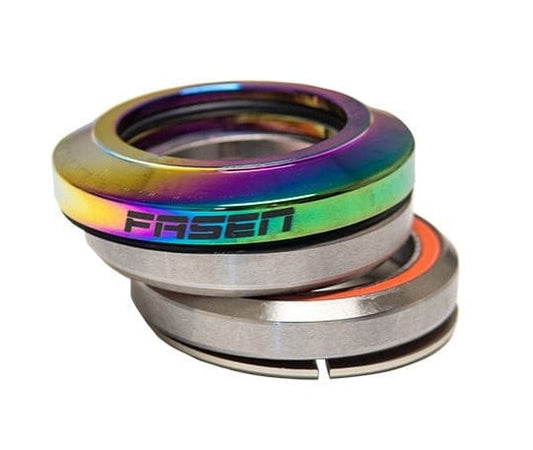 The Fasen Integrated Stunt Scooter Headset - Neochrome, with its aluminum top cap and smooth bearings, flaunts a shiny multicolored finish. The silver base is designed in two stacked parts, offering a sleek, modern appeal ideal for integrated stunt scooter headsets or bicycles.