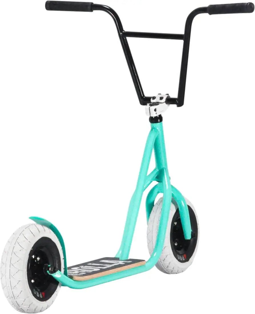 Introducing the Rocker Rolla Big Wheel Complete Scooter in Teal, a sleek and modern scooter featuring a black handlebar, white wheels, and a stylish wooden deck. With its design inspired by mini BMX bikes, this eye-catching Rocker scooter makes a bold statement against a plain white background.