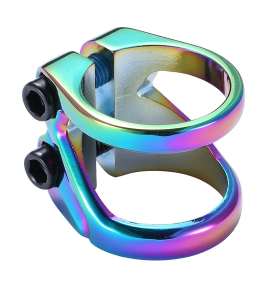 The Blunt Envy Z 2 Bolt Oversized Stunt Scooter Clamp in Oil Slick Neochrome is a vibrant, metallic double clamp with iridescent rainbow hues and two black screws. Designed for scooter bars, it showcases smooth, rounded edges and a reflective finish.