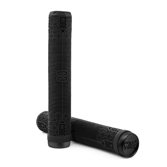 Two CORE Skinny Boy Black Stunt Scooter Grips, ideal for action sports riding, are displayed upright against a white backdrop. They have a textured surface with "CORE" embossed on them, with one resting against the other. These 170mm scooter grips provide superior shock resistance for an improved experience.