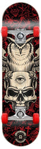 The Madd Gear MGP Pro Series Watcher Red / Black Complete Skateboard, measuring 8" x 31", showcases a vivid design featuring an owl perched atop a skull with a third eye, set against red and black abstract patterns. It is equipped with a sturdy 9 Ply maple deck and smooth Carbon Steel ABEC 3 bearings, accentuated by striking red wheels.