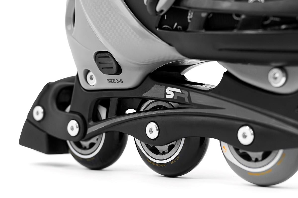 Close-up of the SFR Cyclone II Adjustable Inline Skates - Ninja wheels and frame, highlighting a sleek black and gray design. These skates by SFR feature adjustable sizing from 3-6 and boast a modern appearance with durable PU wheels, ideal for smooth rollerblading adventures.