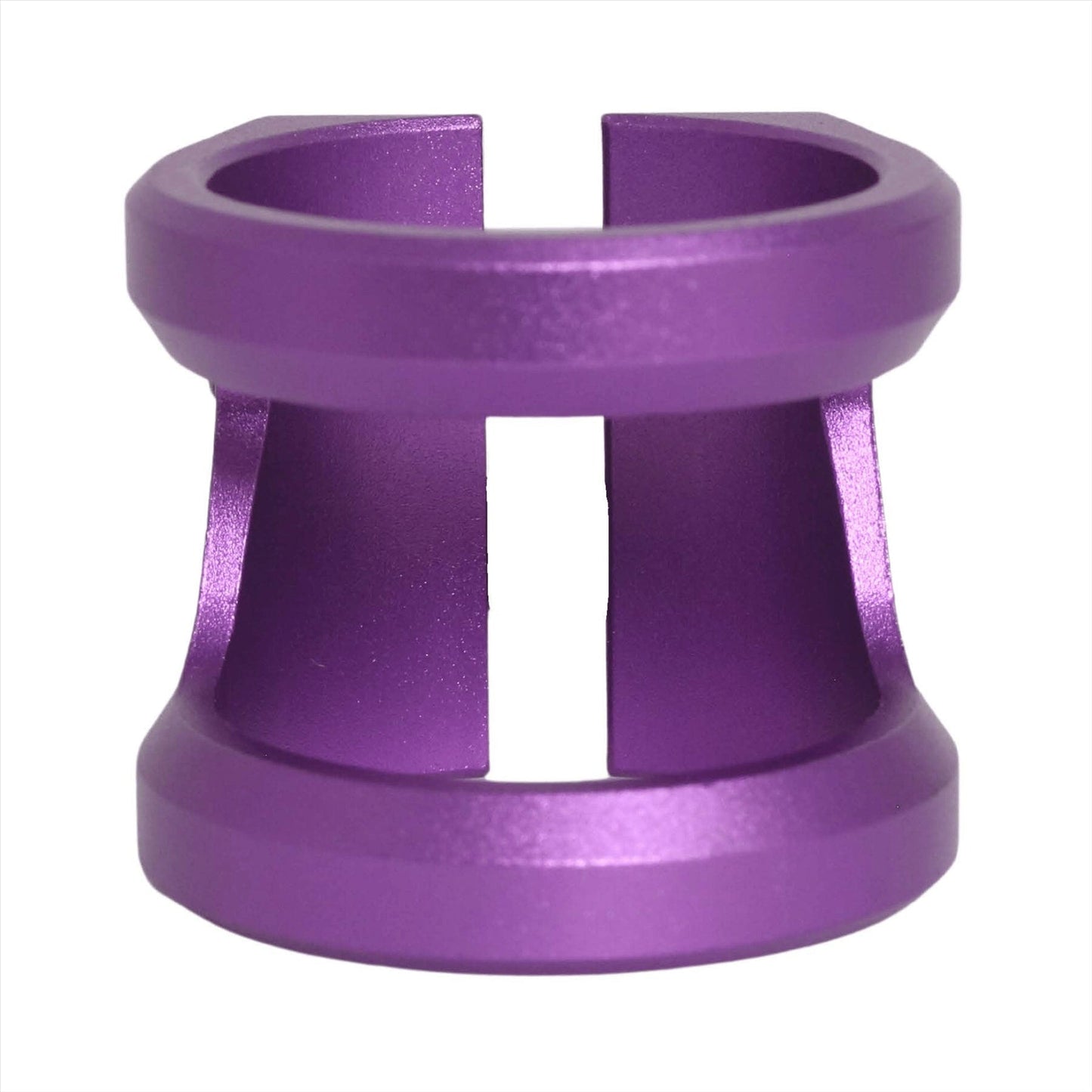 A purple, metallic cylindrical object with a hollow center and flat top and bottom surfaces, featuring a side gap that resembles the design of the Root Industries GT 2 Bolt Oversized Stunt Scooter Clamp - Purple. This ensures compatibility with lightweight scooters with various bar sizes.