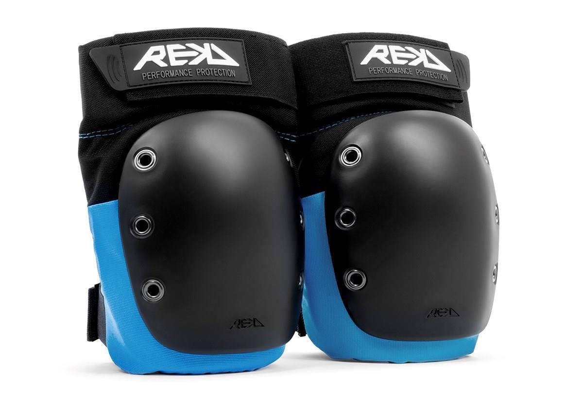 Introducing the REKD Ramp Knee Pads in a black and blue colorway, featuring durable hard black plastic caps. Accented with metal rivets and REKD's distinctive black and silver label, these knee pads provide excellent impact resistance, engineered for peak performance in action sports such as skateboarding or rollerblading.