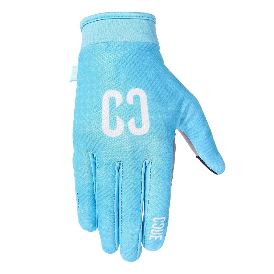 The CORE Aero Skate Protection Gloves in teal showcase a geometric pattern with the "CC" logo prominently displayed on the back of the hand. The word "CODE" is printed near the wrist, complemented by a black accent on the thumb. These gloves are touch screen friendly and include grip-enhancing features.