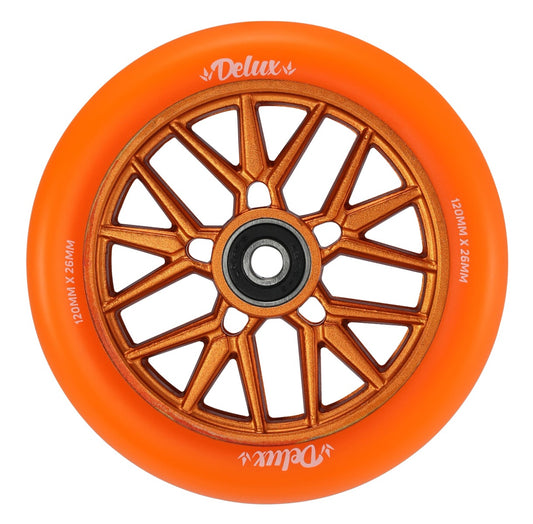 An image showcases the Blunt Envy Delux 120mm Stunt Scooter Wheel in vibrant orange, featuring a bronze metallic hub with intricate spoke designs crafted from anodized aluminum. The brand name "Delux" is elegantly printed in white on the wheel, making it an ideal choice for enthusiasts of stunt scooter wheels.