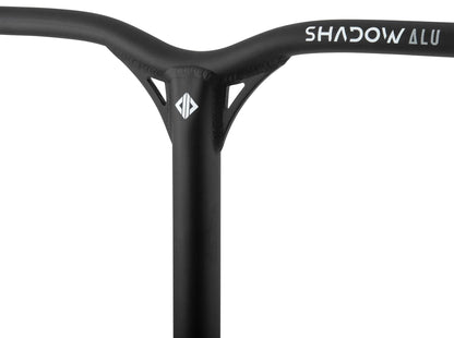 Close-up of a black handlebar with an angular Y-Bar design, featuring "SHADOW ALU" text. It resembles the sleek style of Drone Shadow 2 Aluminium IHC Stunt Scooter Bars in Black (650mm x 530mm).