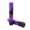 Displayed are two cylindrical, textured grips featuring a black and purple camo pattern. These are the CORE Skinny Boy Fuchsia Stunt Scooter Grips, with one standing upright while the other leans gracefully against it. Embossed with "CORE," these shock-resistant grips guarantee a firm hold on your scooter or bike during every ride.