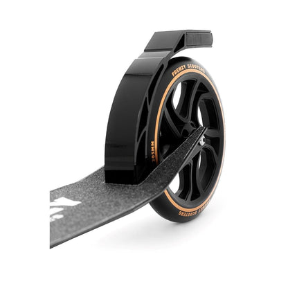 Close-up view of a black scooter wheel with a gold-edged tire and an attached rear brake, belonging to the stylish Frenzy 205mm Dual Brake V4 Foldable Commuter Scooter. The wheel is set on a textured foldable deck equipped with an innovative cable folding system, all displayed against a white background.