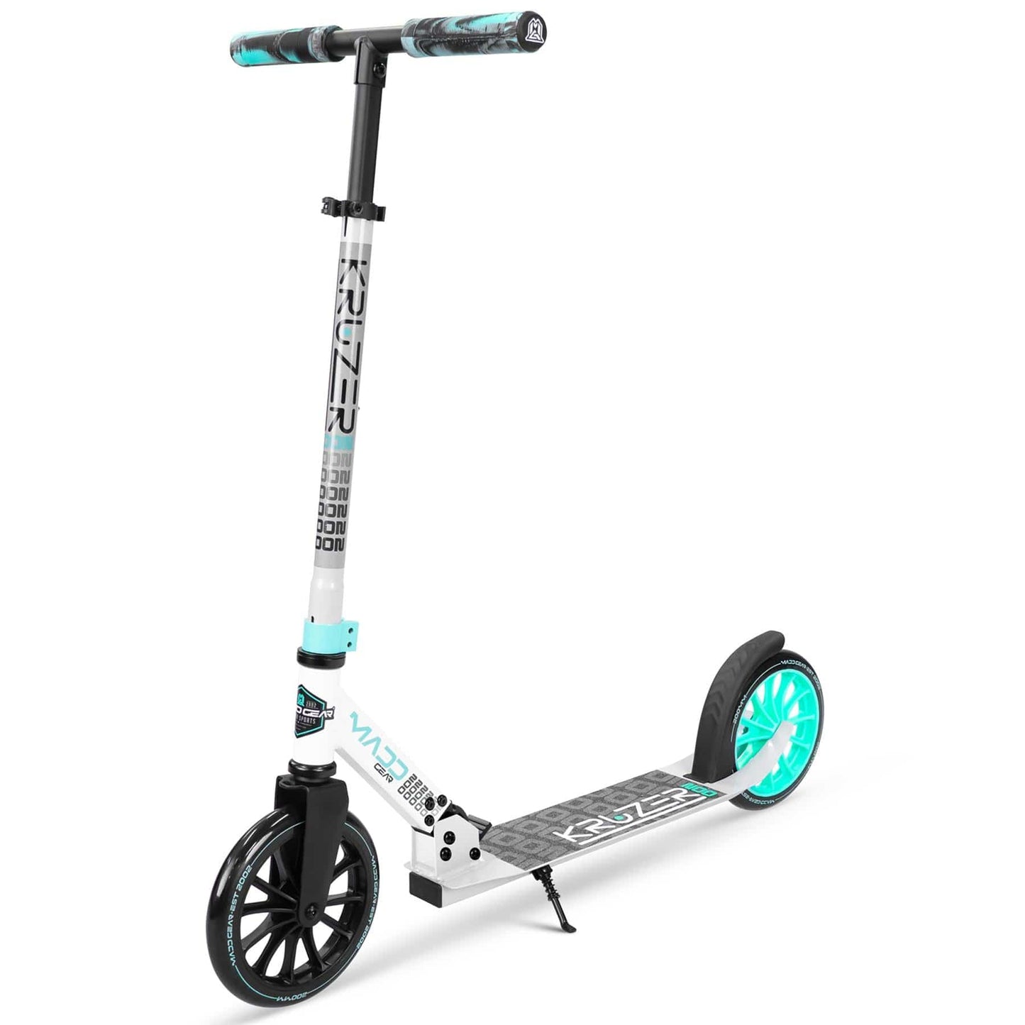 The Madd Gear MGP Carve Kruzer V2-200 Commuter Foldable Scooter in Grey and Teal is a sleek folding scooter with adjustable handlebars, designed for commuting. It features a patterned deck, a larger front wheel paired with a smaller rear wheel, and includes a kickstand. The brand's distinct logo is displayed on the frame.