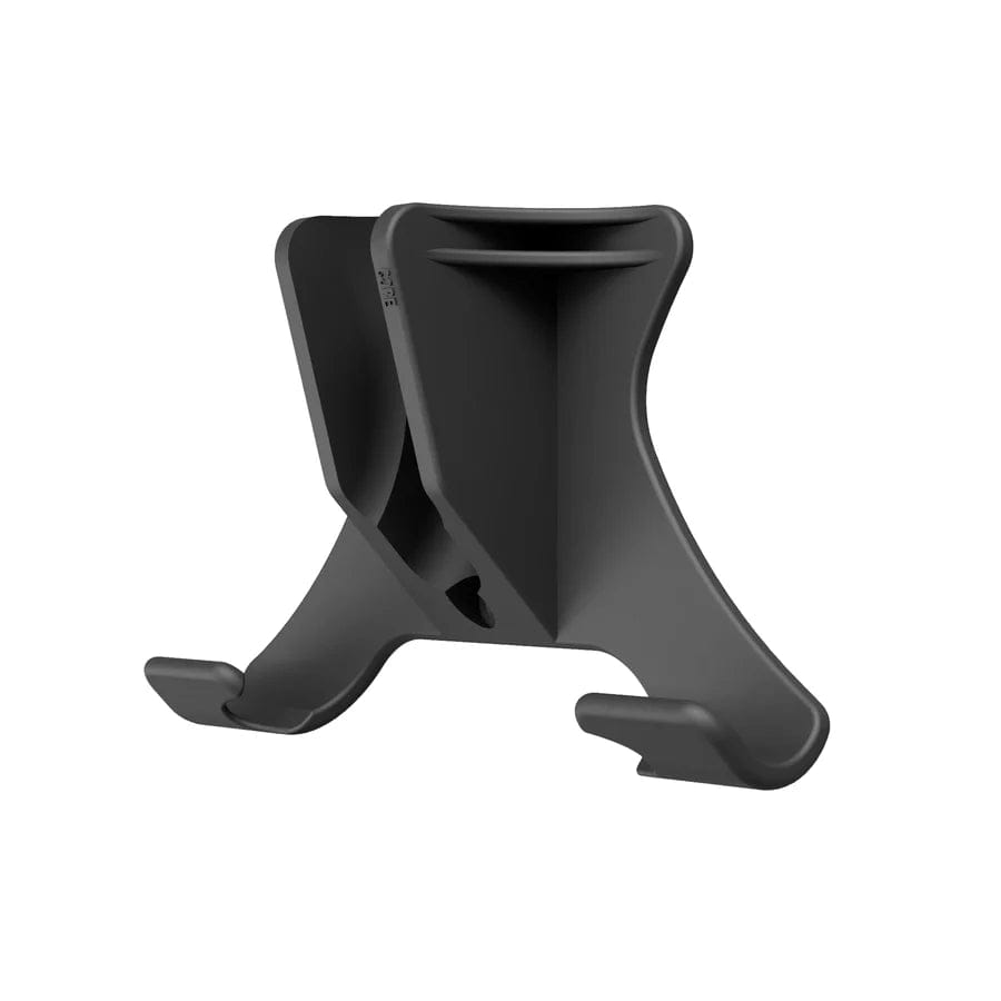 The CORE Scooter Wall & Floor Stand - Black by CORE is a minimalist black plastic stand designed to hold devices with its two angled arms and stable base, evoking the design of a small scooter stand. The stand is set against a white background.