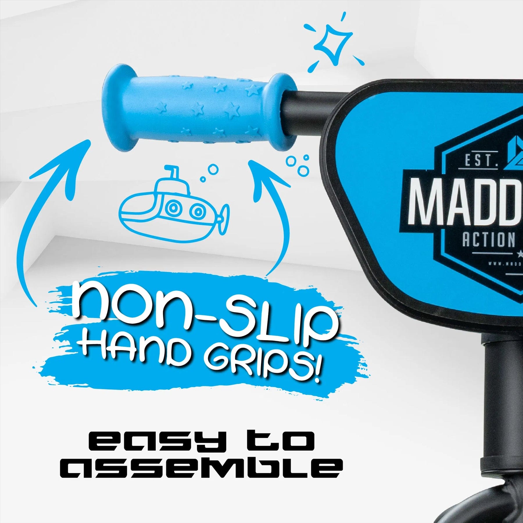 Close-up of a blue scooter handle showing non-slip grips, ideal for kids 18 months to 4 years. Text reads "non-slip hand grips!" next to a submarine and "easy to assemble" below. Perfect for youngsters with the Madd Gear (MGP) My 1st BMX Balance Bike - Black / Blue!.