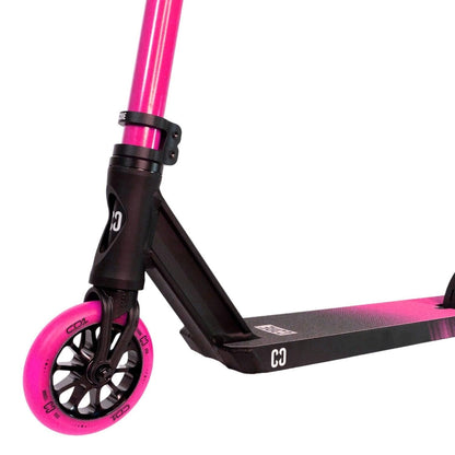 The CORE CD1 Complete Stunt Scooter by CORE in pink and black features a sleek design with a pink handlebar and front wheel, along with a robust black aluminum deck, making it ideal for beginner riders.