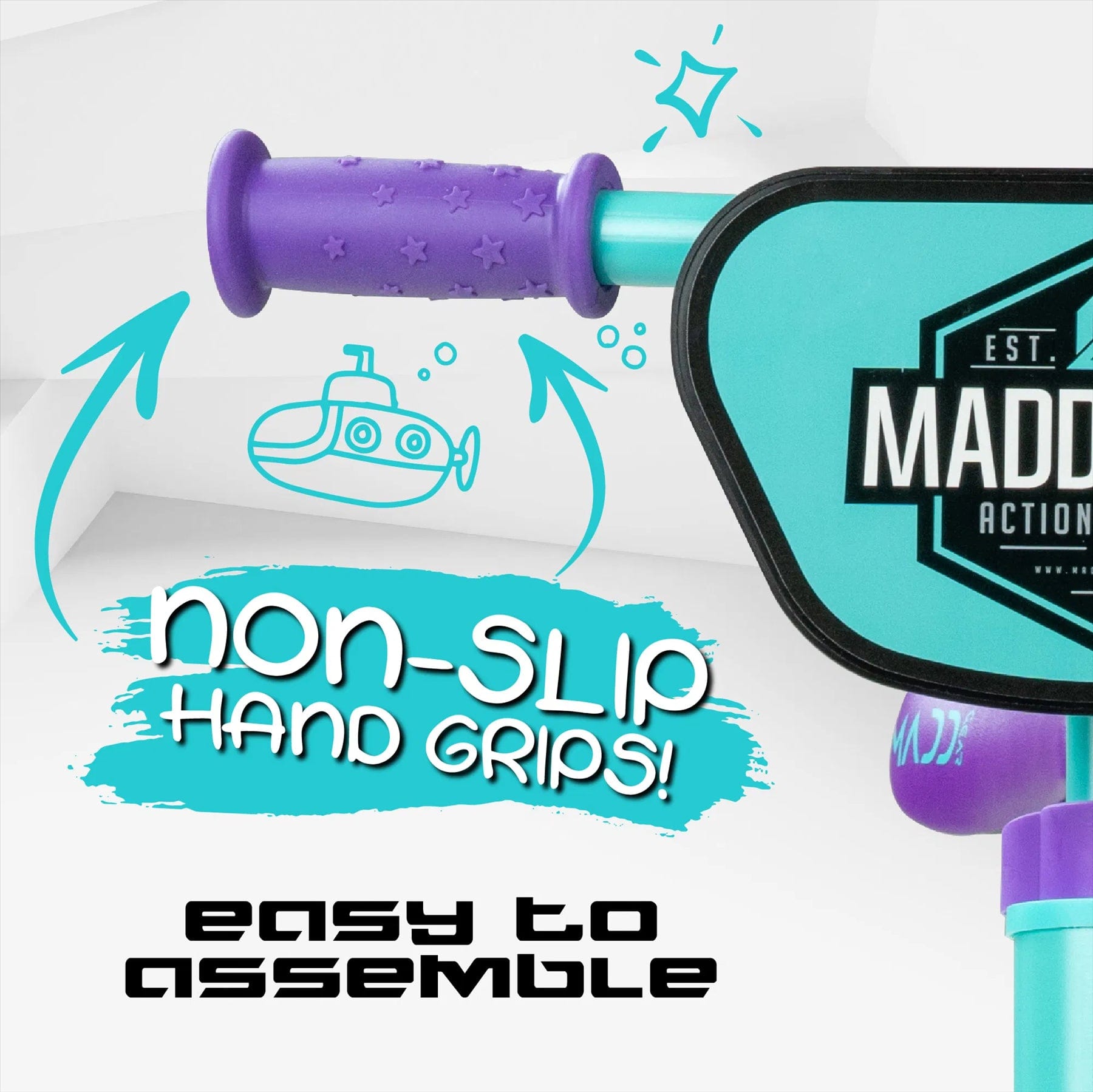 A close-up of a child's scooter handle shows a purple, star-patterned rubber grip. It emphasizes "non-slip hand grips" and "easy to assemble" features with playful graphics, making it ideal for Madd Gear (MGP) My 1st BMX Balance Bike - Teal / Purple riders.