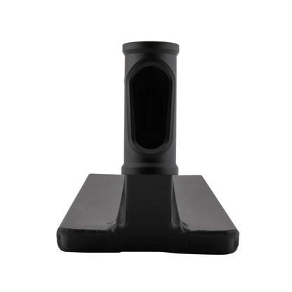 Close-up of a black vacuum cleaner floor nozzle with a flat rectangular base, resembling the sleek design in Drone's Nexus 'Saundezy' Black Signature collection. The nozzle has an oval vacuum hose connection highlighting its smooth plastic surface.