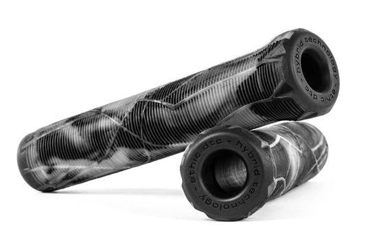 A pair of 160mm slim, black and white marble-patterned Ethic Slim Glow Stunt Scooter Grips with "hybrid technology" embossed on the built-in bar ends, designed like Ethic DTC grips, set against a plain white background.