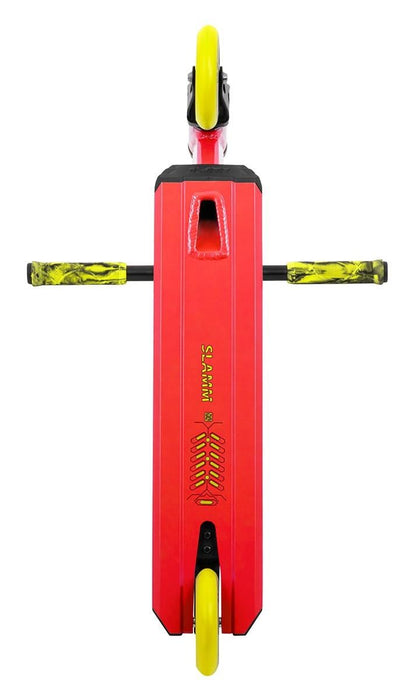 The Slamm Classic Mini Complete Stunt Scooter in red, featuring yellow wheels and handlebars with a yellow pattern, is pictured from above on a white background. It captures the vibrant energy of a scooter designed for exhilarating freestyle stunts.