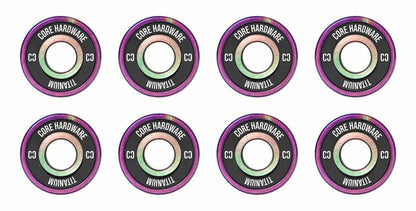 A set of eight vibrant skateboard bushings from CORE, known as the Titanium Neochrome Skateboard Bearings, are arranged in two rows of four. They feature a shiny iridescent finish with purple accents and are lightweight with anti-corrosive properties, with each bushing having a central hole.