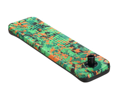 A foam knee pad with a green, orange, and black camouflage pattern, specifically designed for gardening. It includes a black handle on one end for easy carrying, offering a level of convenience similar to handling the Blunt Envy TS Pro 6 Indoor Trampoline Stunt Scooter in Orange Camo.