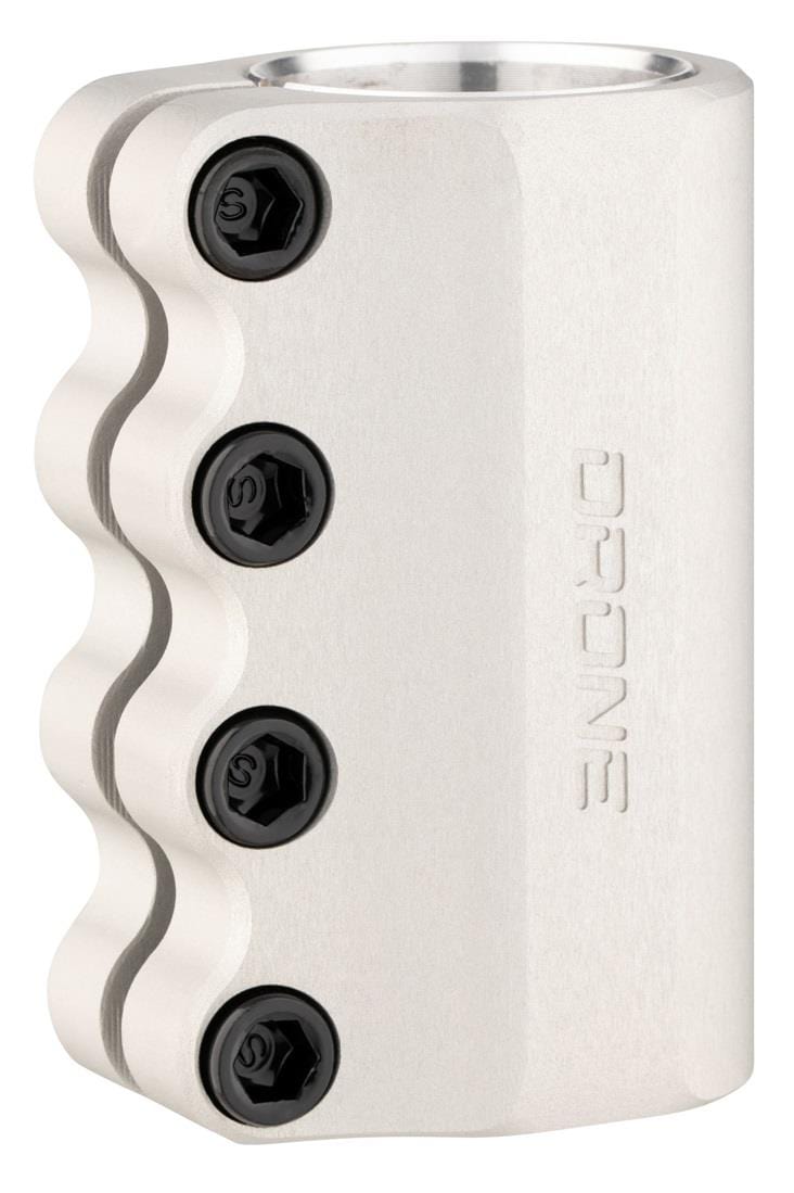 The Drone Contrast 3 4 Bolt Oversized SCS Stunt Scooter Clamp in silver is expertly crafted from durable 7075 aluminum, featuring a wavy edge and secured with four black screws. It withstands tough stunts while showcasing the "Drone" brand engraving.