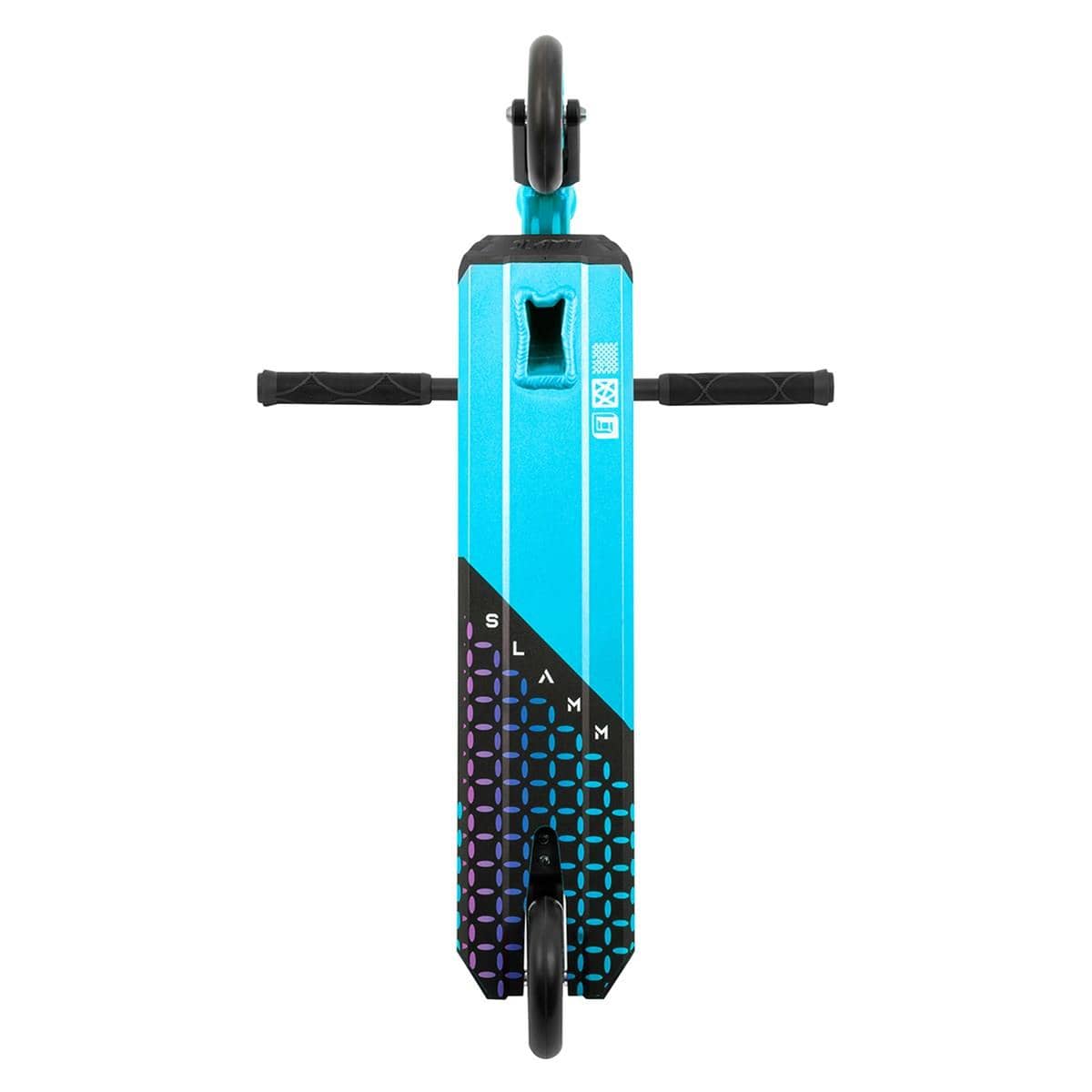 A top-down view of the Slamm Assault Complete Stunt Scooter - Blue showcases its turquoise and black design, featuring a textured alloy deck pattern. The black handlebars extend horizontally, while the 110mm aluminum wheels at both the front and rear provide a symmetrical look.