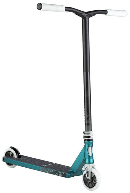 The Lucky Prospect 2025 Complete Stunt Scooter - Daydream by Lucky features a teal deck with grip, a T-shaped black vertical bar, white handle grips, and two sleek white wheels, offering a lightweight design built for agility and style.