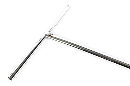 A polished raw silver T-shaped tool, made from 4130 Chromoly Steel with elongated handles, is displayed flat on a white surface. Its gleaming finish resembles that of high-quality Ethic DTC Trianon Steel Standard ICS/IHC stunt scooter bars, measuring 720mm by 560mm.