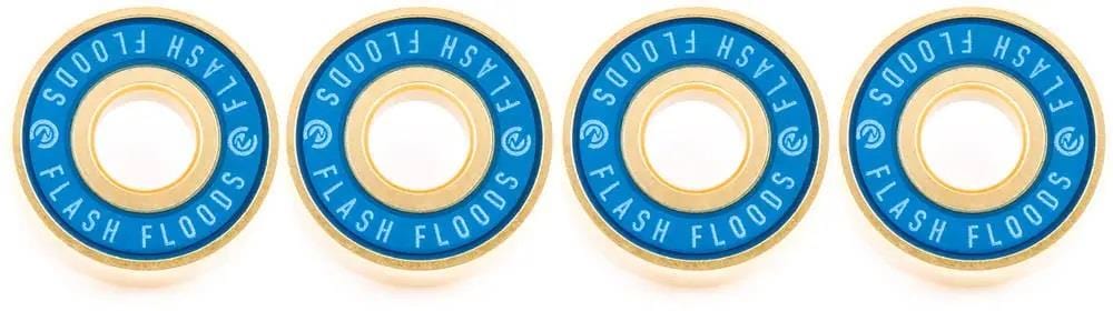 Four River Flash Floods ABEC 7 scooter bearings in blue and gold are neatly arranged. Each premium bearing displays "Flash Floods" in white on the outer ring, evocative of fast-flowing river currents.