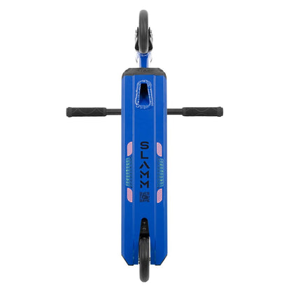 A top view of the Slamm Classic Complete Stunt Scooter in blue, equipped with black Pro Team grips and the brand name "Slamm" displayed in white on its deck. Positioned vertically, it highlights its 110mm alloy wheels and textured rectangular deck.