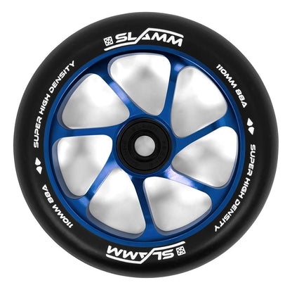 Detailed view of the Slamm Team 110mm Stunt Scooter Wheel in blue, showcasing white text along the edge that reads "110mm BBA" and "Super High Density." The stylish design features an aluminium core and a high-rebound PU structure, presenting a glossy blue interior with a robust black rubber exterior.