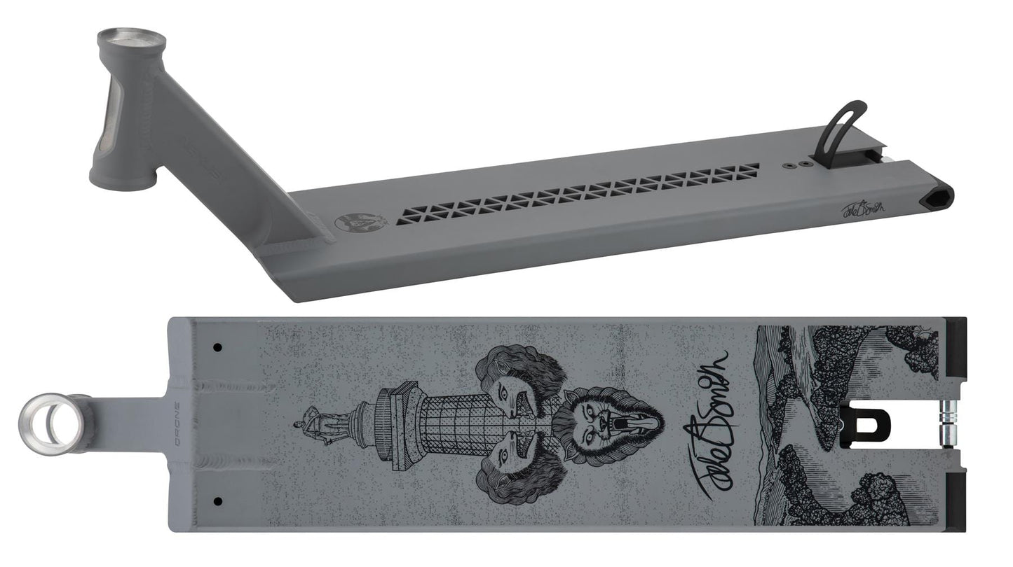 Image of the Drone Nexus 'Jake B Smith' Grey Signature Stunt Scooter Deck, featuring a detailed black design with columns, lion heads, and patterns. This 6.5" x 22" model has cutouts for weight reduction and a gripped surface, with the brand name in stylized text.