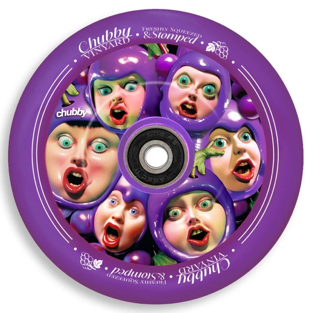 A purple circular disc featuring six exaggerated cartoon faces that resemble grapes, each with a surprised expression. The text reads "Chubby Grape Juice" and "Freshly Squeezed & Stomped," capturing the lightweight design similar to a 110mm stunt scooter wheel by Chubby.