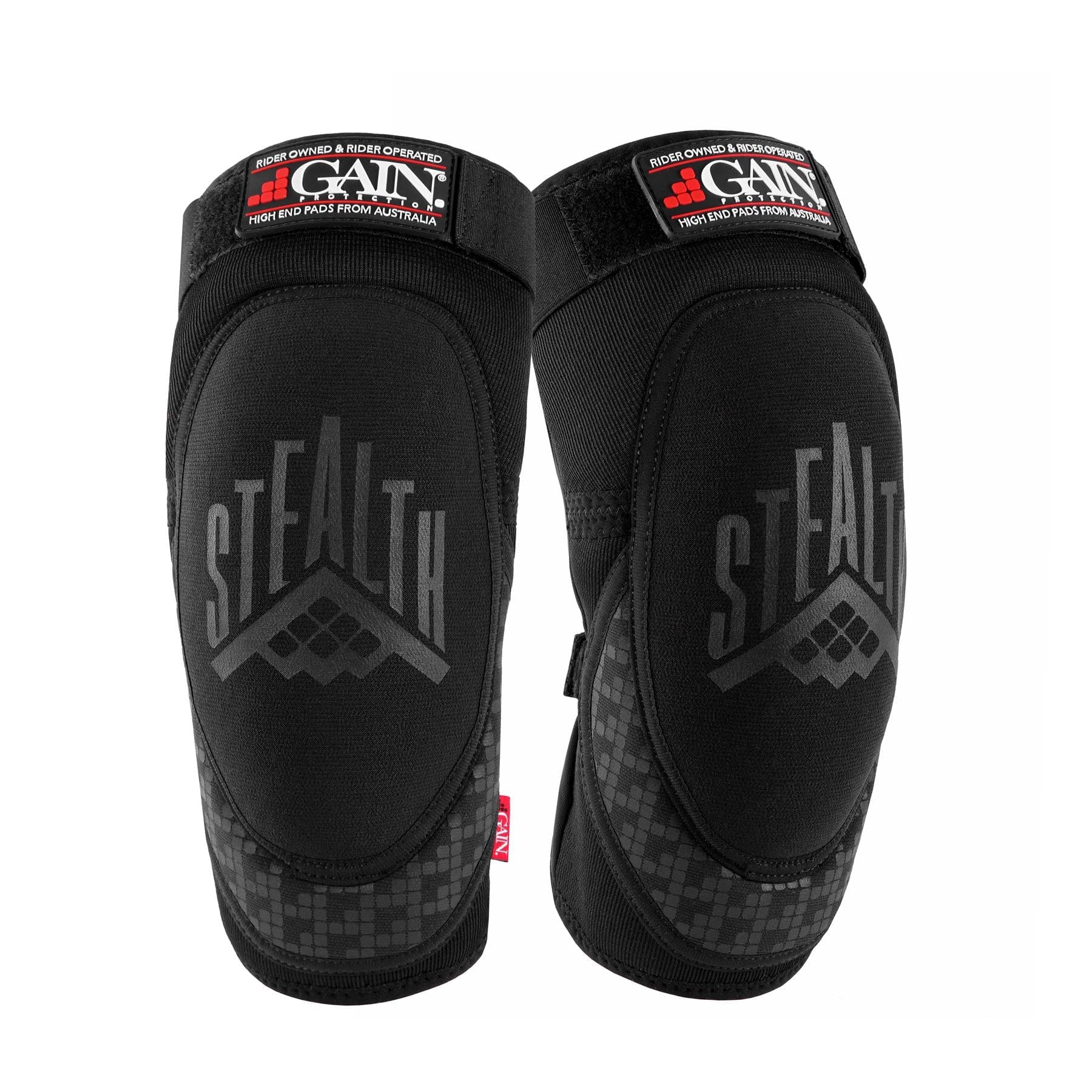 Introducing the GAIN Protection Stealth Knee Skate Pads in Black, constructed from DuraTec neoprene and equipped with EN1621-1 certified foam for maximum protection. These pads showcase the Gain logo at the top, a textured lower section, and "Stealth" prominently displayed on the front—perfect for sports or protective use.