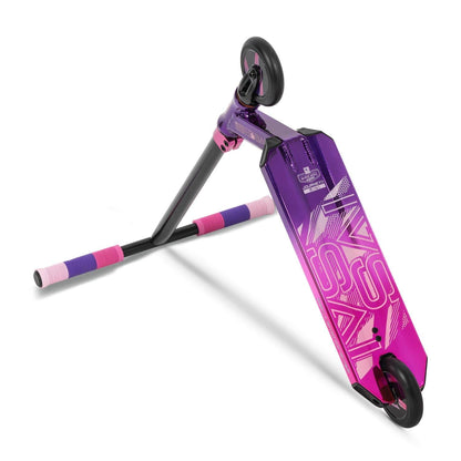 The Invert Supreme Journey 1+ Mini Jamie Hull Stunt Scooter in Tri Electro Pink and Purple is shown at an angle, showcasing its vibrant purple deck and eye-catching pink, purple, and blue handle grips. Its sleek design emphasizes the rear wheel and deck graphics, making it perfect for beginners seeking skatepark adventures.