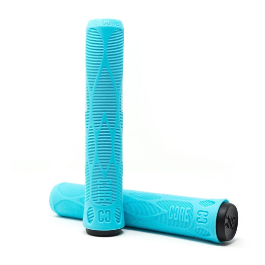 The image features a pair of teal scooter grips with a vibrant textured design. These cylindrical grips showcase a diamond-patterned surface and are equipped with black end caps, each embossed with the "CORE" brand name. They are ideal for action sports enthusiasts and serve as perfect replacements for the CORE Skinny Boy Scooter Grips at 170mm in length.