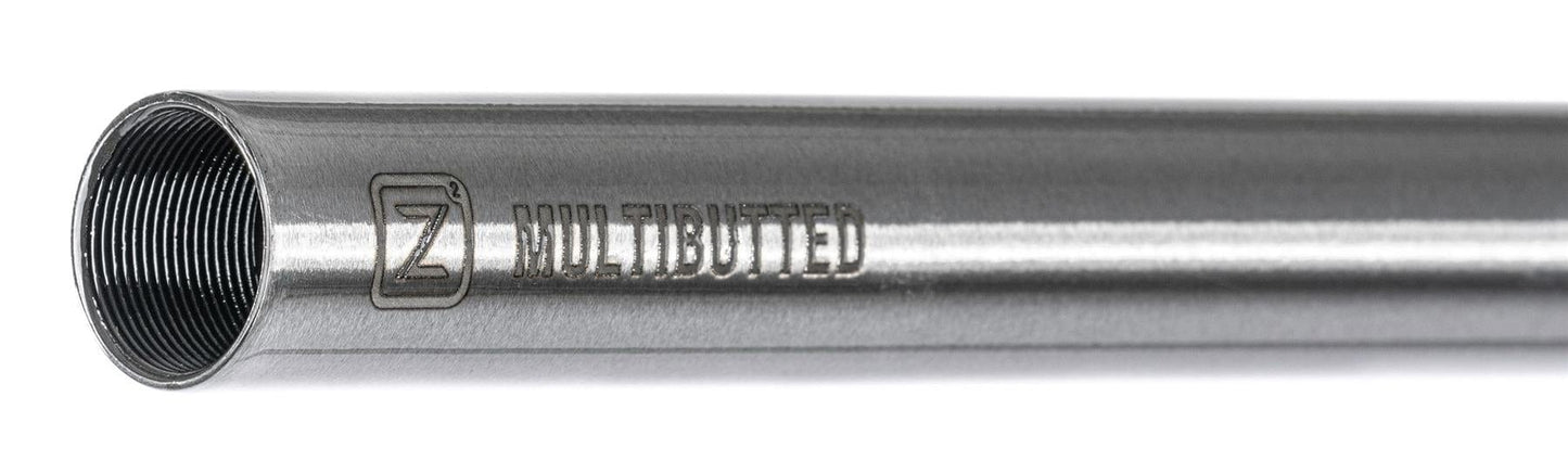 Close-up of a metal tube from the Ethic DTC Tenacity V2 series with "MULTIBUTTED" and a "Z" square symbol engraved. Used in lightweight stunt scooter handlebars, it features a threaded interior and polished exterior.