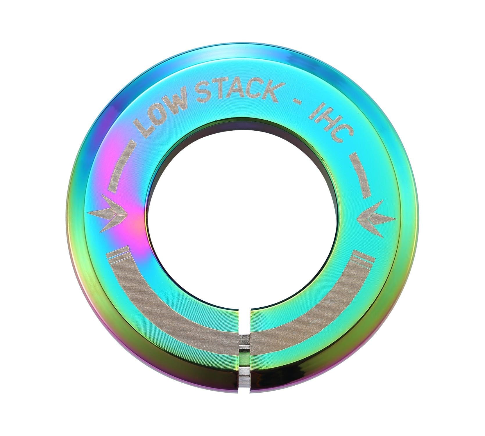 The Blunt Envy Low Stack IHC Integrated Stunt Scooter Headset in Oil Slick Neochrome features a circular, metallic design with an iridescent finish and the text "LOW STACK - IHC" accompanied by two arrow-like symbols. It includes a bottom slit and boasts a shiny, reflective surface with sealed bearings perfect for use with an IHC compression system.