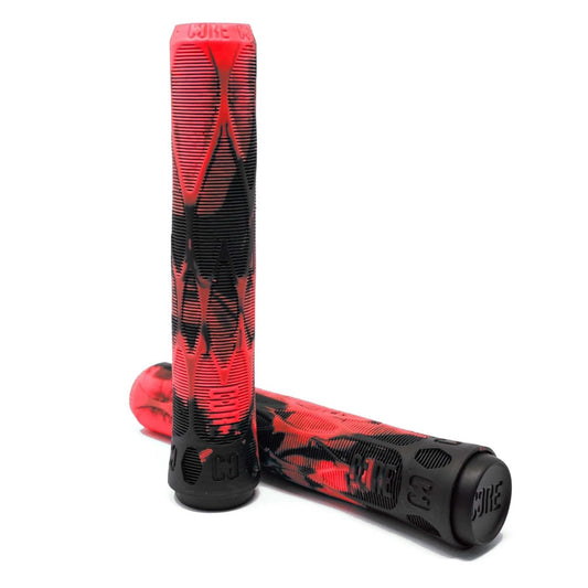 A pair of CORE Skinny Boy Lava Stunt Scooter Grips - 170mm, in black and red with a textured surface, is set against a white background. One grip stands upright while the other leans against it, designed specifically for action sports riding. With shock resistance and the "CORE" brand name embossed on their ends, these grips promise durability.