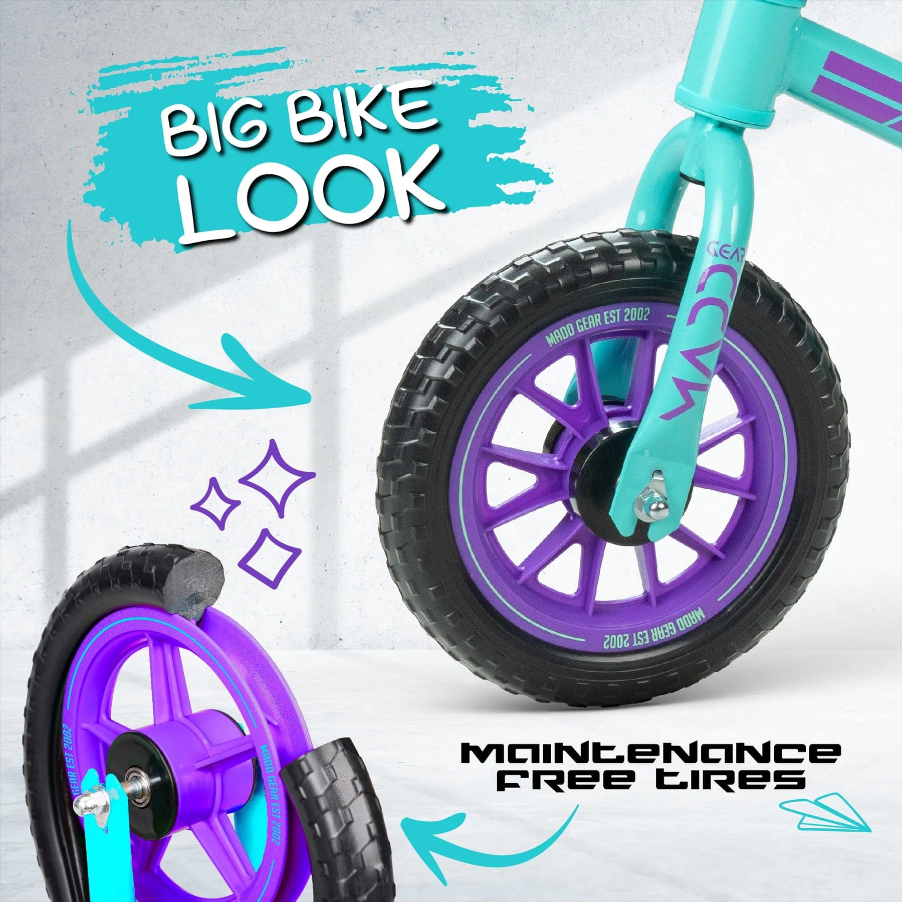 Close-up image of the Madd Gear My 1st BMX Balance Bike - Teal/Purple. Arrows highlight "Big Bike Look" and "Maintenance Free Airless Tyres" against a textured background, featuring its turquoise frame and vibrant purple wheels.