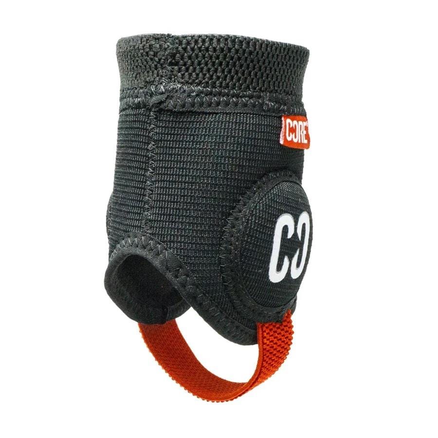 A black protective ankle guard labeled "CORE" is ideal for skating. Designed with a secure closure, it offers essential support during high-impact activities.