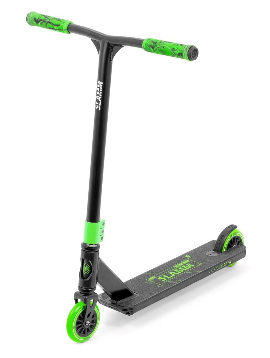 Introducing the Slamm Classic Mini Complete Stunt Scooter in black and green, an ideal entry-level scooter with a sleek design for budding freestyle enthusiasts. It showcases green handle grips, a black deck adorned with the green Slamm logo, and wheels accented in green. The scooter is elegantly displayed upright against a white background.