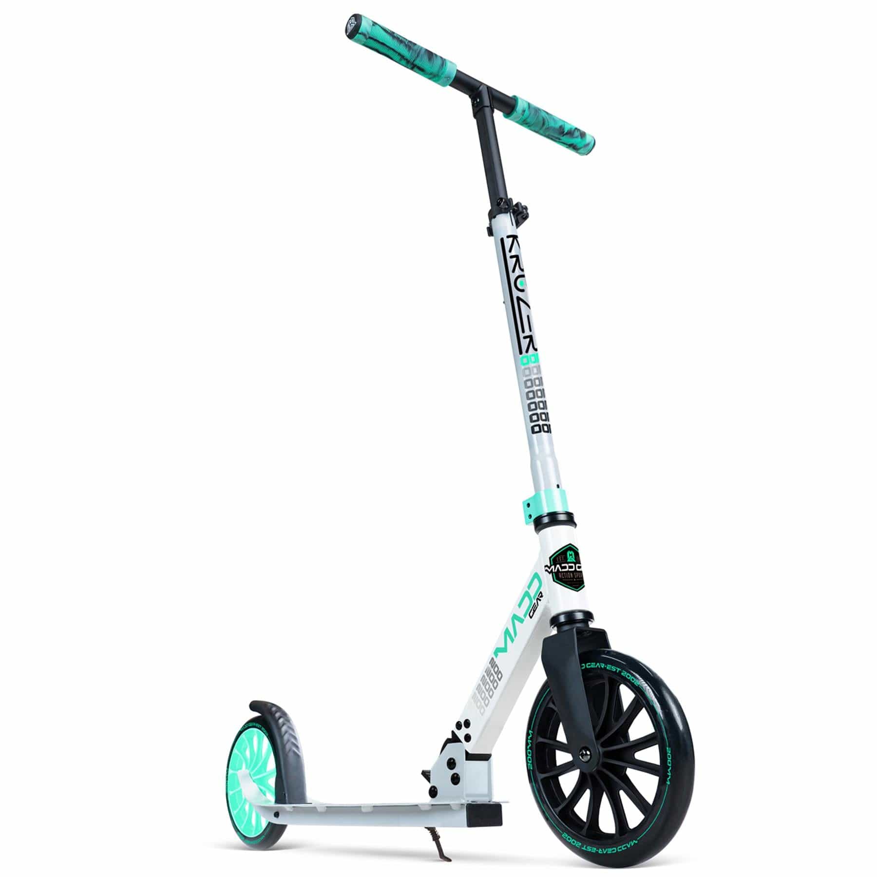 The Madd Gear MGP Carve Kruzer V2-200 is a grey and teal foldable scooter featuring large black and turquoise wheels. It has teal grips on the handlebars, a kickstand, and a glowing design on the back wheel. Ideal as a commuter scooter, its frame is adorned with graphics and logos.