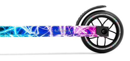 A close-up of the Slamm Strobe Complete Stunt Scooter - Multi highlights its precision engineering. The deck features a vivid blue and pink abstract design with crisscrossing lines, while the wheel is black with aluminum silver spokes, accented by striking red, green, and purple details.