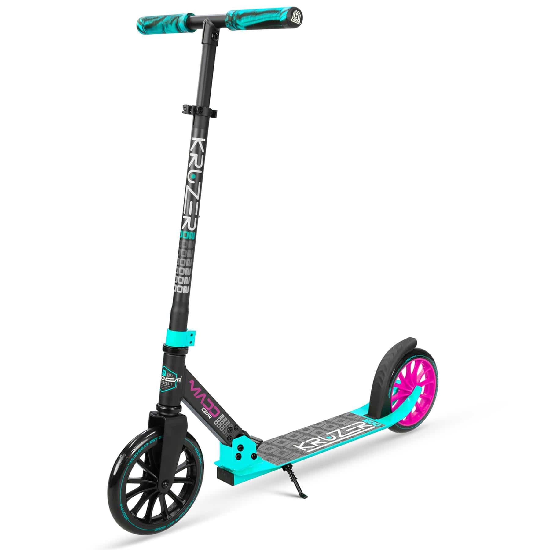 The Madd Gear MGP Carve Kruzer V2-200 Commuter Foldable Scooter in black and teal is a stylish option featuring large wheels and a sturdy frame accented with turquoise and magenta. It boasts a folding design, textured foot deck, and adjustable handlebars with comfortable grips for an easy ride.