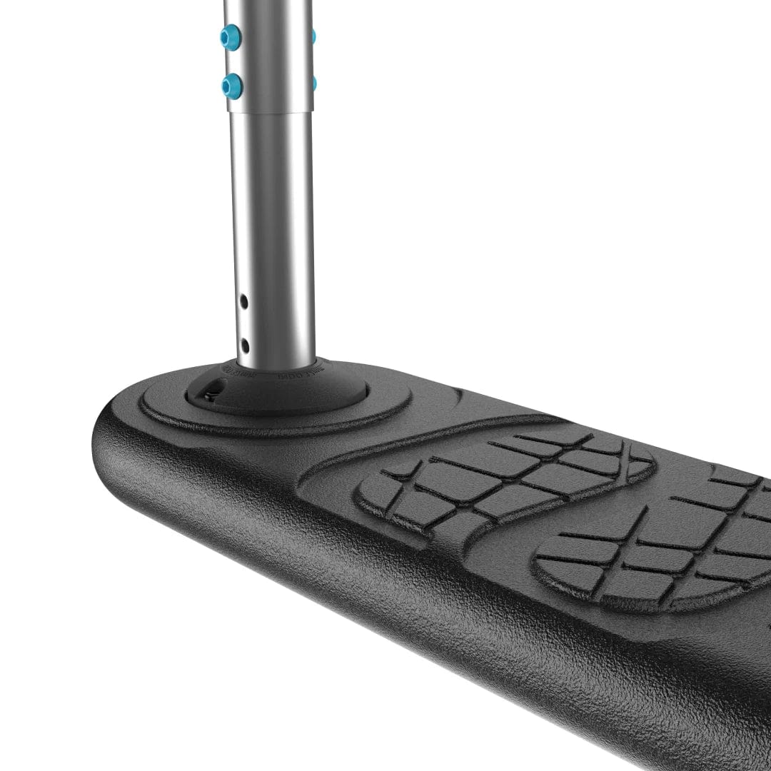 Close-up of the INDO Kickstart Classic Indoor Trampoline Stunt Scooter in black, showcasing its textured deck with an adjustable handlebar. The handlebar features blue adjustment buttons, and the deck displays a pattern resembling shoe imprints. Perfect for trick playground enthusiasts, this setup is set against a crisp white background.